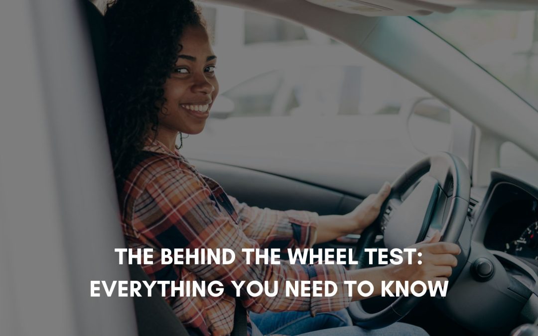 The Behind-the-Wheel Test: Everything You Need to Know - Photo of a girl behind the wheel of her vehicle.